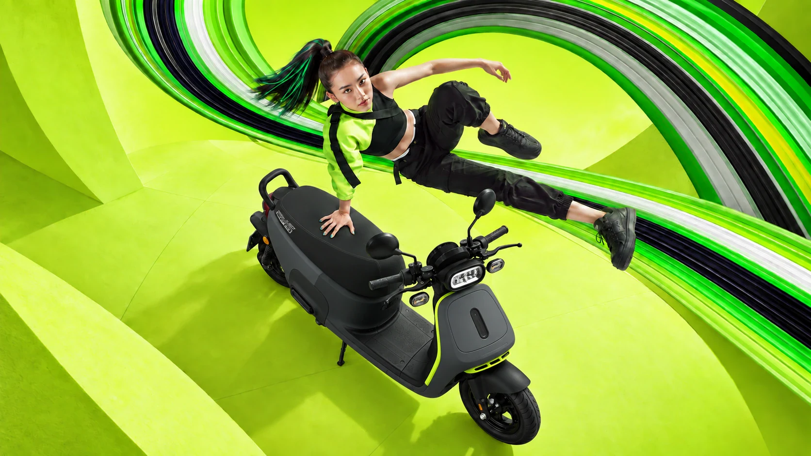 Visual extension: overhead view and airborne female performer