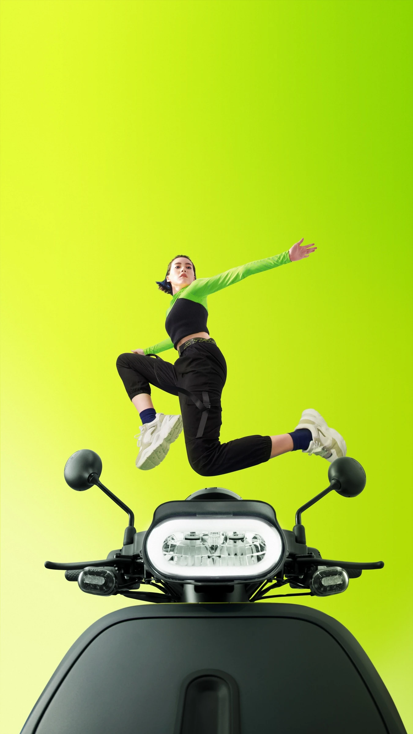 Original portrait campaign: performer airborne above the headlight