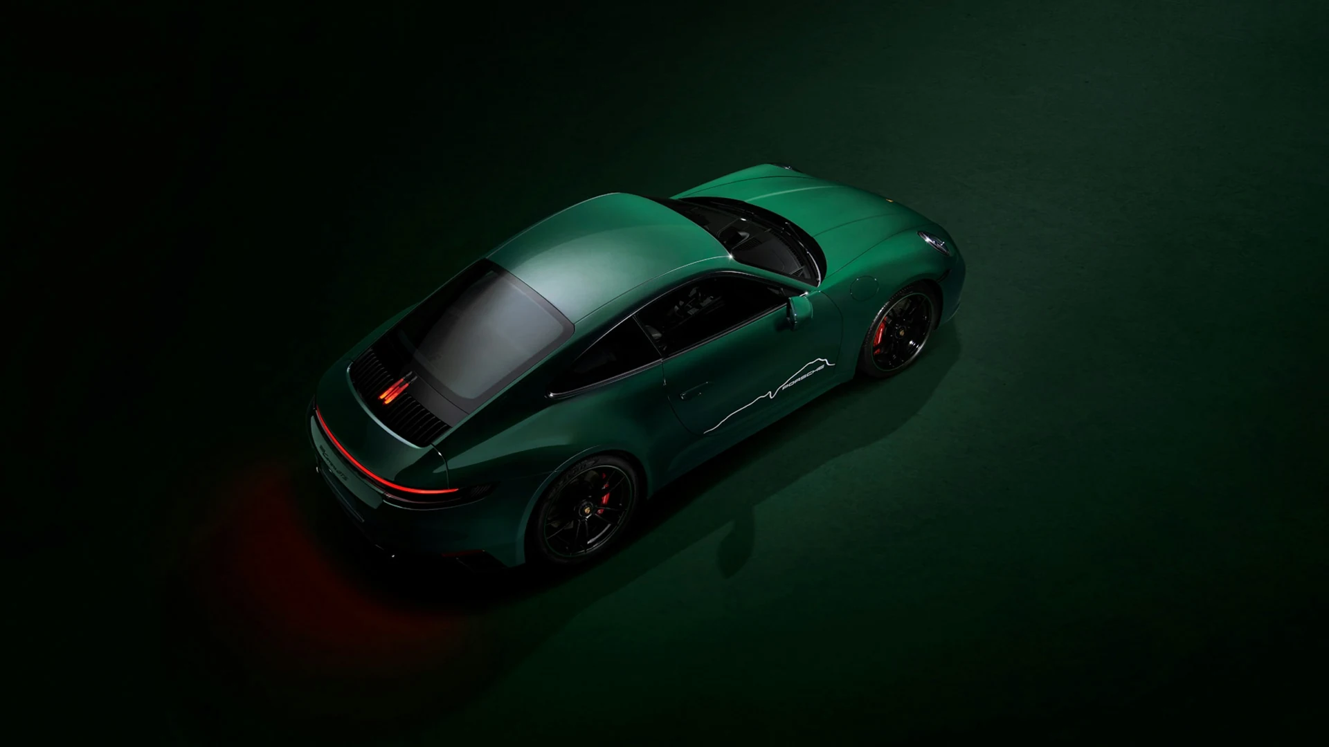 Overhead view of the Irish Green 911, silver roof and sculpted rear body