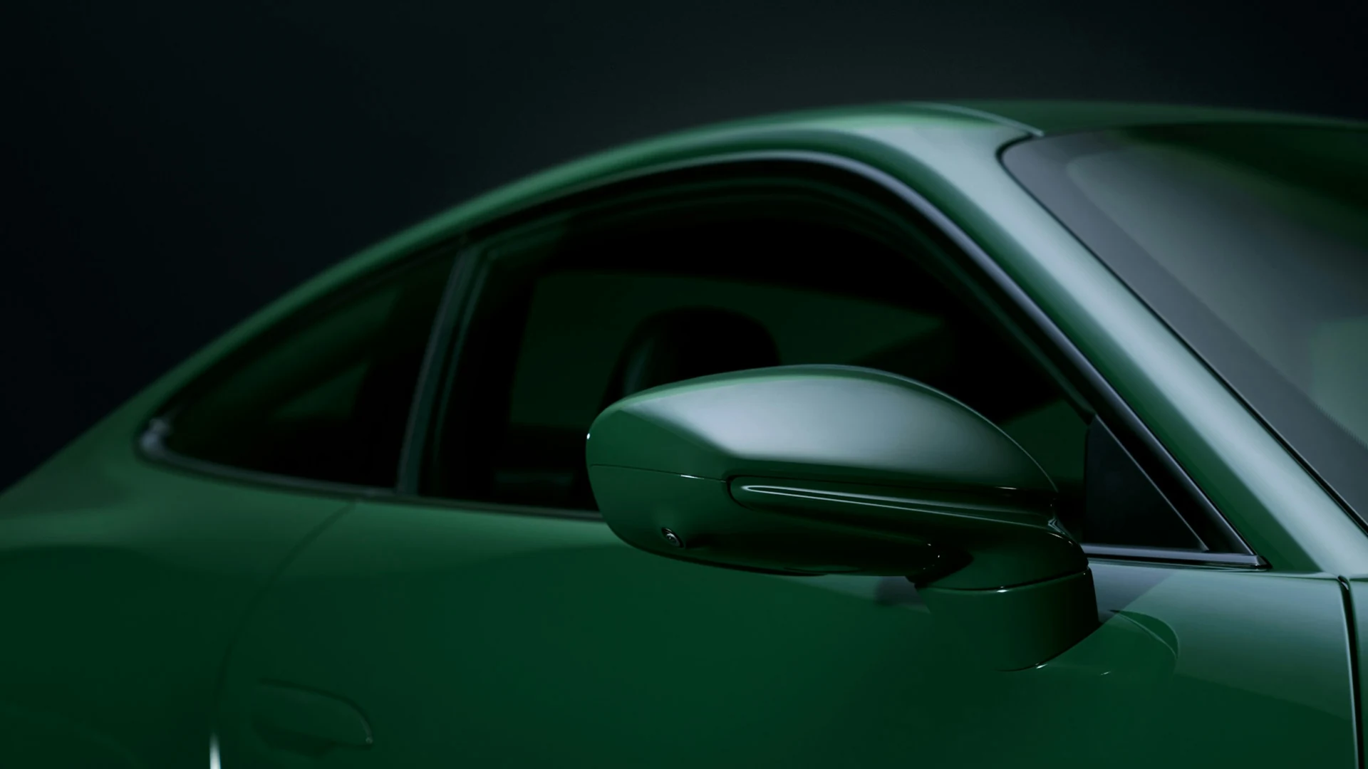 Controlled highlights along the green roof line and door mirror